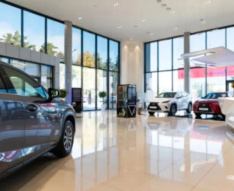 Bright and spotless car dealership showroom after commercial cleaning in Washington D.C.
